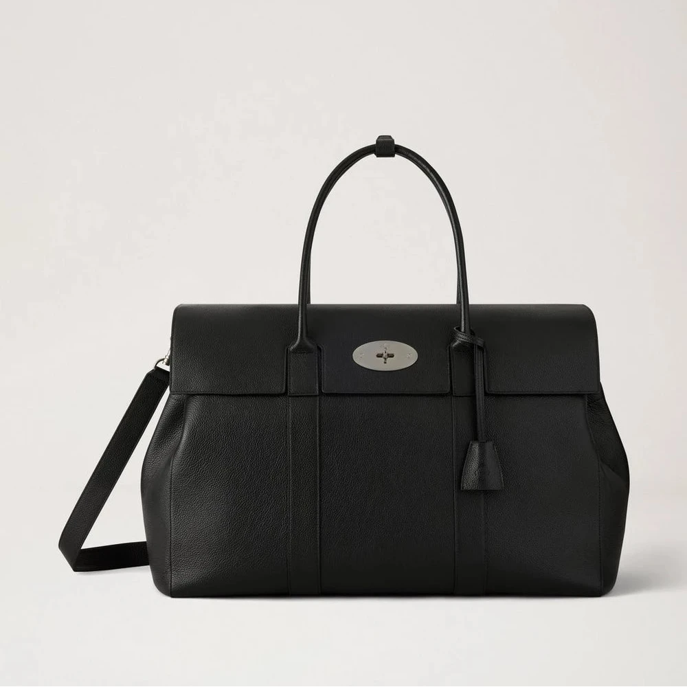 Mulberry handbag i sort læder med håndtag og skulderrem, vist forfra mod lys baggrund. Model 112564