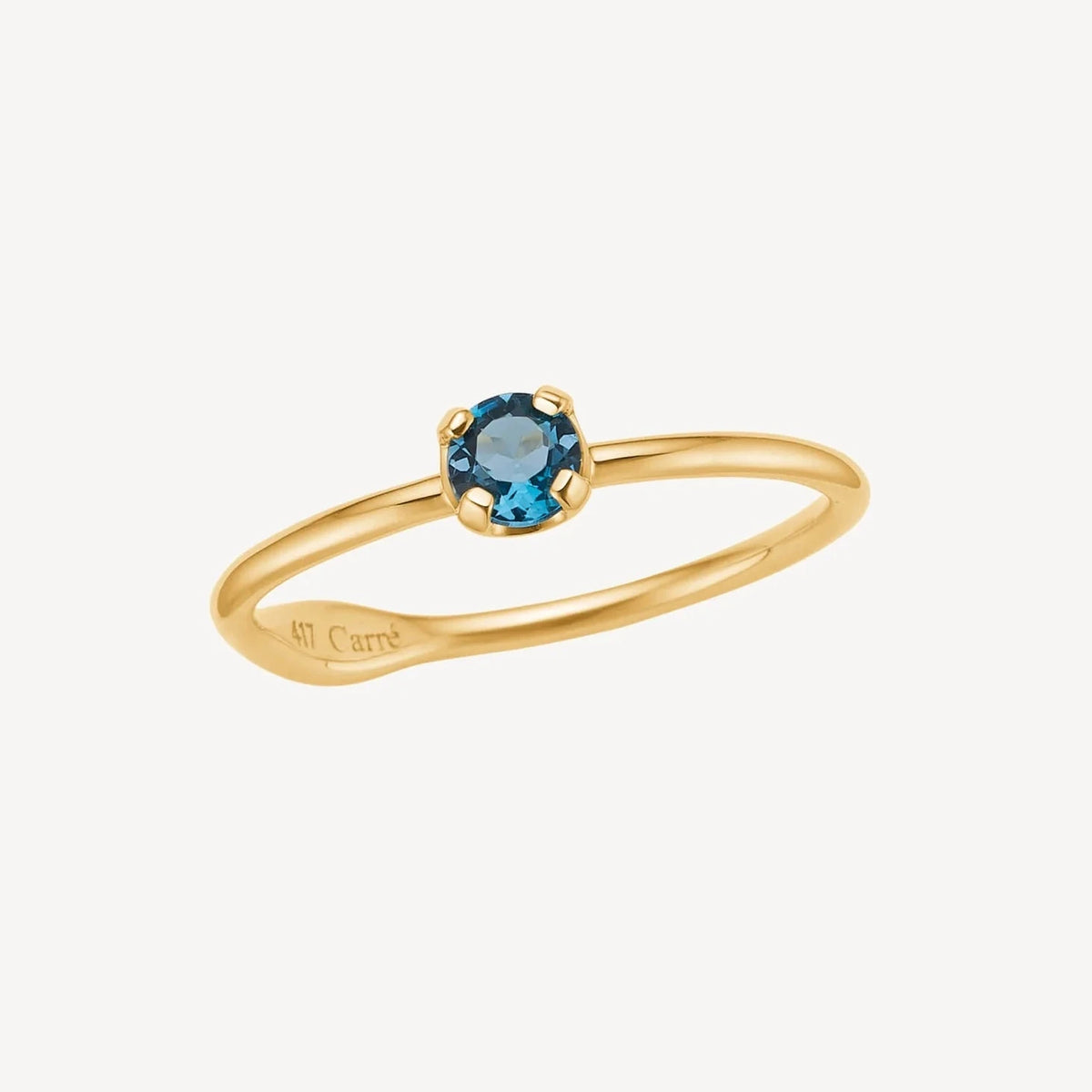 Carré 10kt ring met blauwe topaas