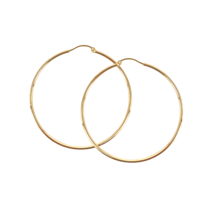 Aqua Dulce Ana Hoop in verguld zilver, twee grote ronde creolen met glanzend gouden oppervlak. Model 5732-5732-1