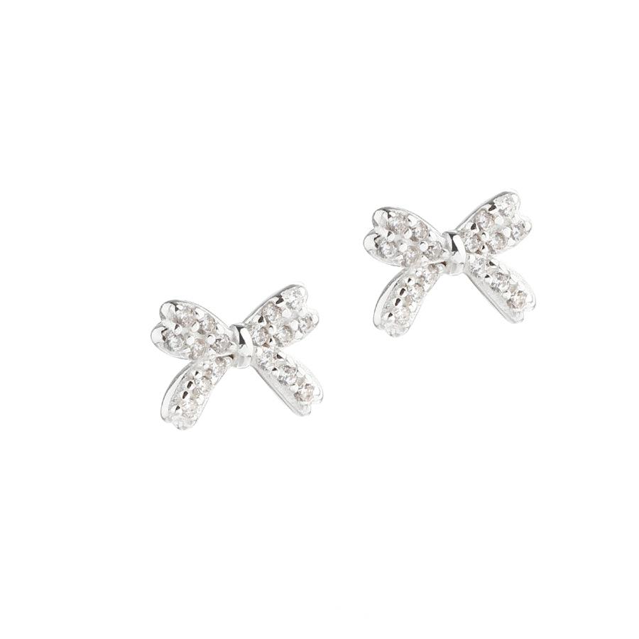Aqua Dulce Darling Bow oorbellen zilver, fijne strikvormige studs met fonkelende steentjes. Model 5697-1.