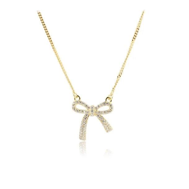 Aqua Dulce Elegant Strikketting Verguld met strikhanger in goudlook en fonkelende stenen, Model 5817-1.