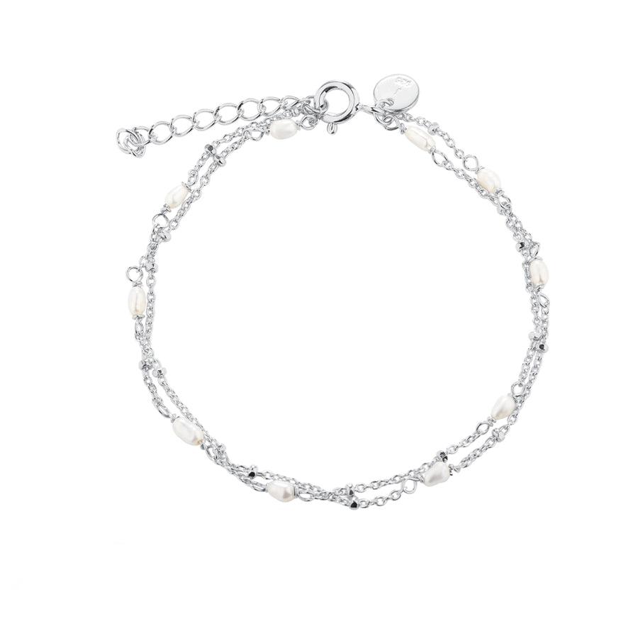 Aqua Dulce Rice Dot Dubbele Armband met dubbele zilveren kettingen en kleine witte parels. Model 5371-5371-1