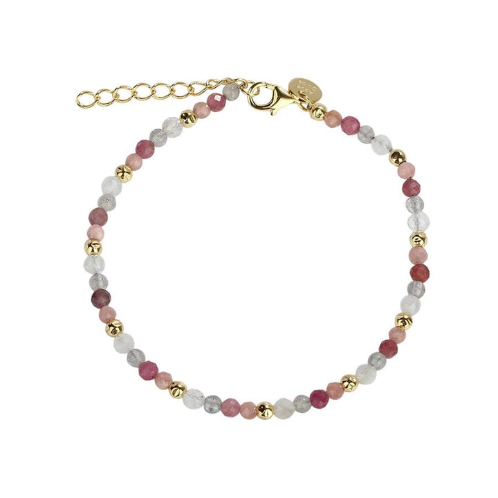 Aqua Dulce SUN Bracelet toont een delicate parelarmband in roze, witte en goudkleurige parels. Model 4556-4556-1