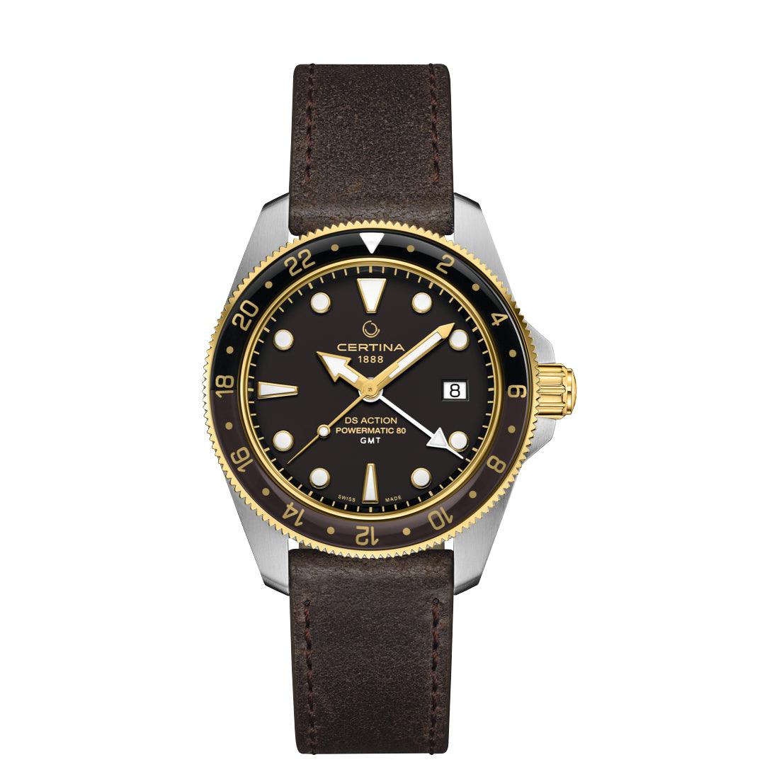 Certina DS Action GMT Powermatic 80 met zwarte wijzerplaat, gouden details en bruin lederen band. ModelC0329292605100