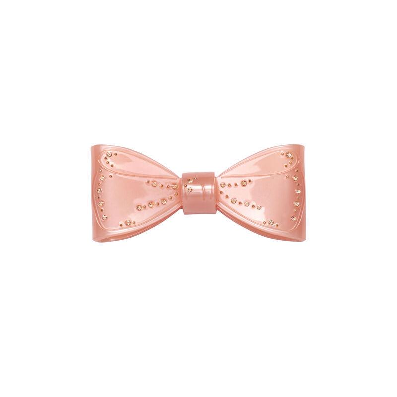 Maanesten Ribin Hair Clip Blush heeft een roze haarclip met gouden strikdetails. Model 3979 - één maat.