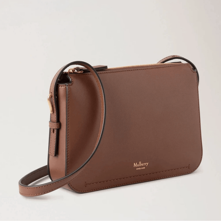 Mulberry Clovelly Pouch Micro Classic Grain Bright Oak in bruin leer met verstelbare riem, model RL8729587G222.