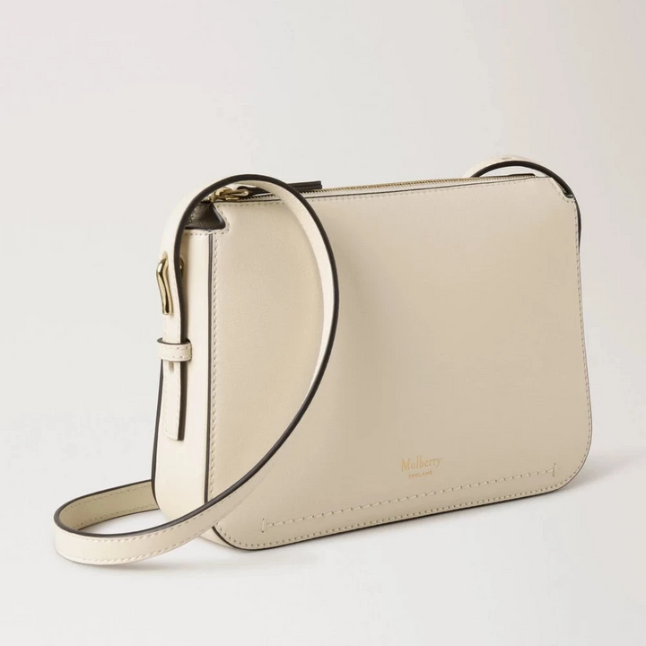 Mulberry Clovelly Pouch Micro Classic Grain Eggshell, klein crèmewit leren tasje met verstelbare riem. ModelRL8729587H687.