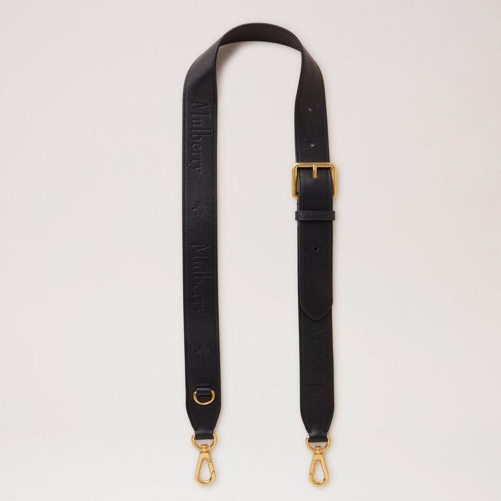 Mulberry Leren band met logo en inscriptie in zwart leer met verstelbare gesp en gouden metalen onderdelen. ModelRX0284587A100.