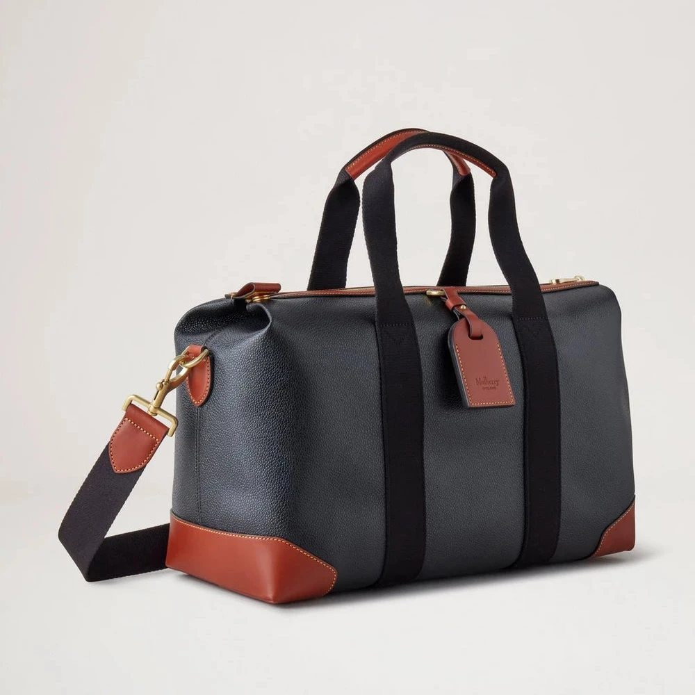 Mulberry Heritage Day Clipper Zwart en Cognac Bioveg Scotchgrain tas met print in zwart en cognac met riem. ModelHS5195127A340