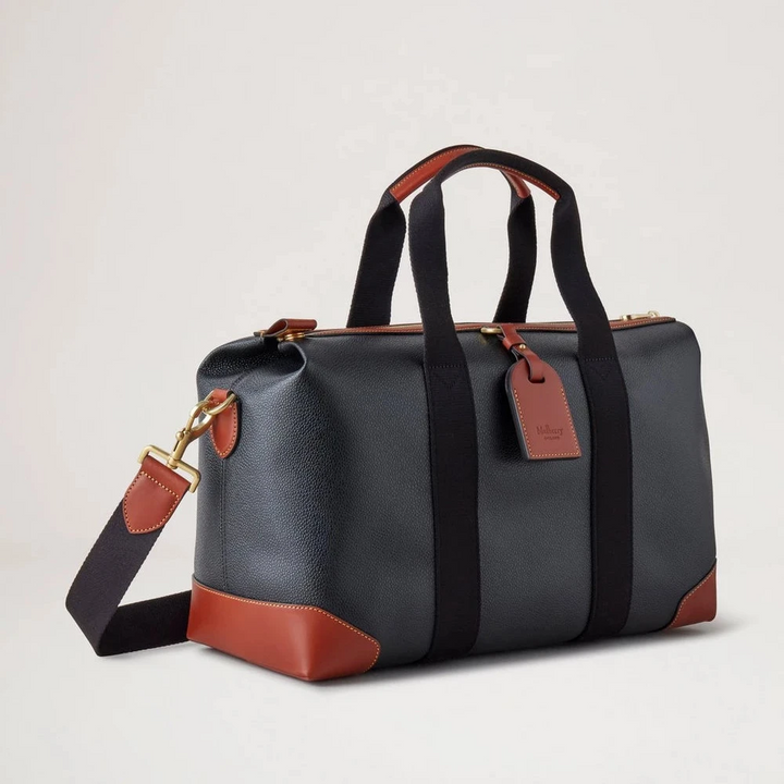 Mulberry Heritage Day Clipper Zwart en Cognac Bioveg Scotchgrain tas met print in zwart en cognac met riem. ModelHS5195127A340