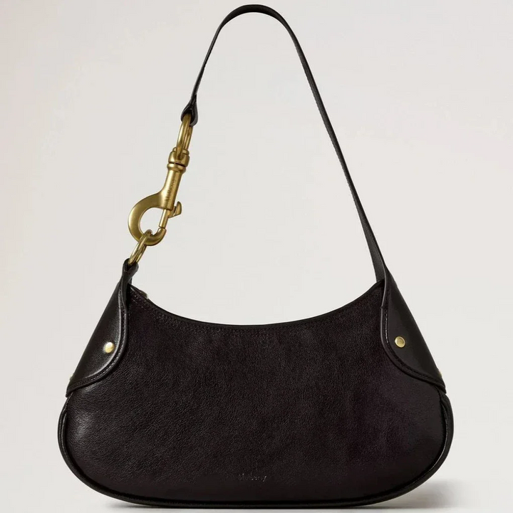 Mulberry Kleine Hackney Schoudertas Ebony Shiny Buffalo toont een donkere schoudertas van glanzend leer met gouden gesp. ModelRL8929726A110.