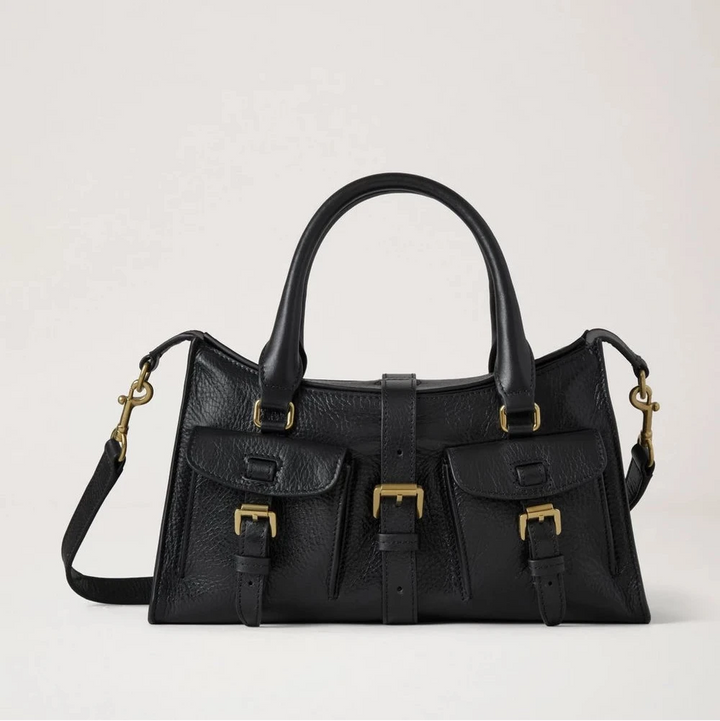 Mulberry Kleine Roxanne High Shine Leather Black toont een zwart leren tas met goudkleurige gespen, model HH9977213A100.