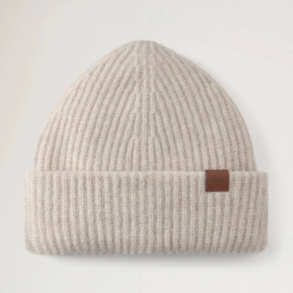 Mulberry Tree Chunky Wool Beanie Oat is een geribbelde beige wollen muts met bruine details. Modelvh4157153h660