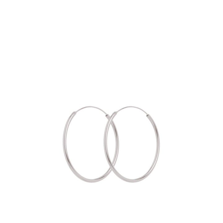 Pernille Corydon Mini Plain Hoops in zilver, eenvoudige ronde oorbellen in klassiek design. Model E-139-S.