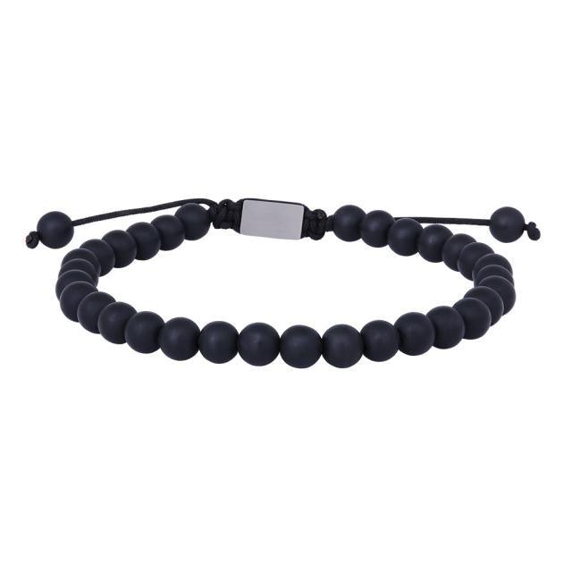 Son of Noa Stone Bracelet toont een zwarte parelarmband met verstelbaar koord, matte afwerking. Model 80980040000
