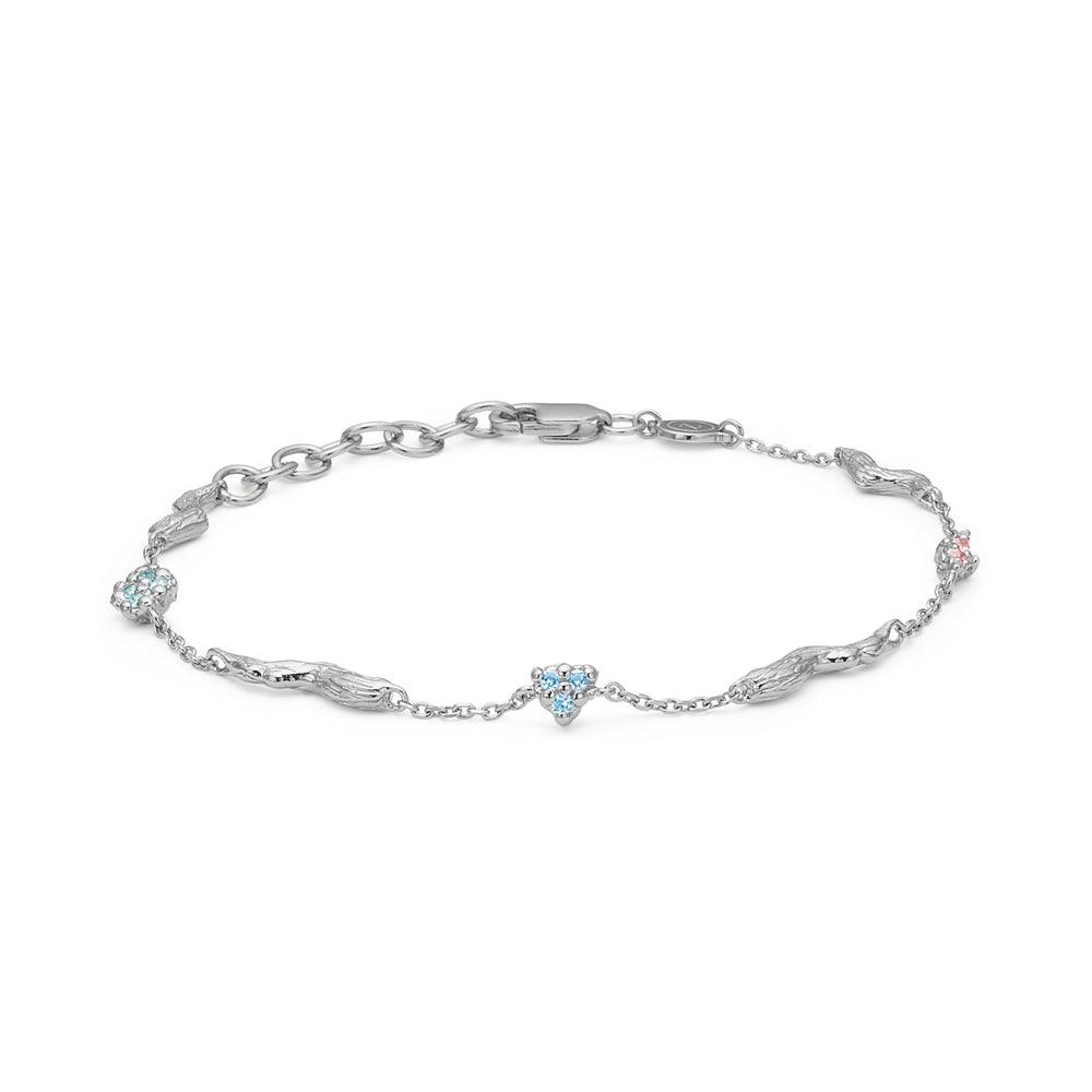 studio-z-tangled-solv-armband-m-blauw-en-roze-zirkonia toont een slanke zilveren armband met blauwe en roze zirkonia. Model 7157847-1