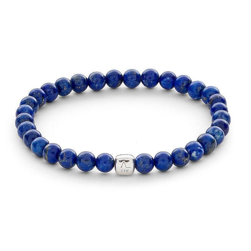 Alexander Lynggaard Armband Lapis 6mm met ronde blauwe kralen en een zilveren detail. Modelc00153-001-1