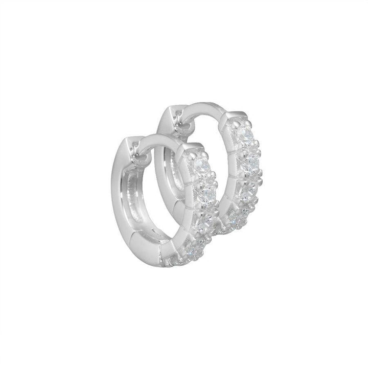 Aqua Dulce Darling zilveren oorbellen met glimmende heldere stenen, rond model. Model 2098-2098-1