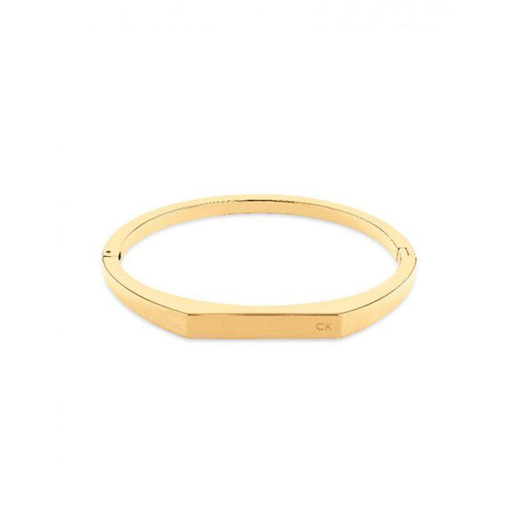 Calvin Klein Faceted Bar Bangle Black Gold, elegante gefacetteerde gouden armband met glad oppervlak. Model 35000046-35000046