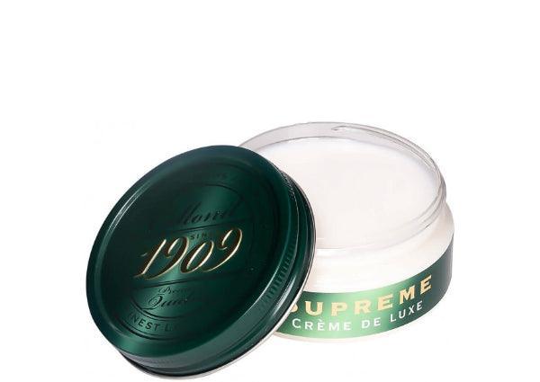 Collonil Supreme Creme Neutraal afgebeeld als een ronde, open pot met een groene deksel en witte crème. Model 79540000050