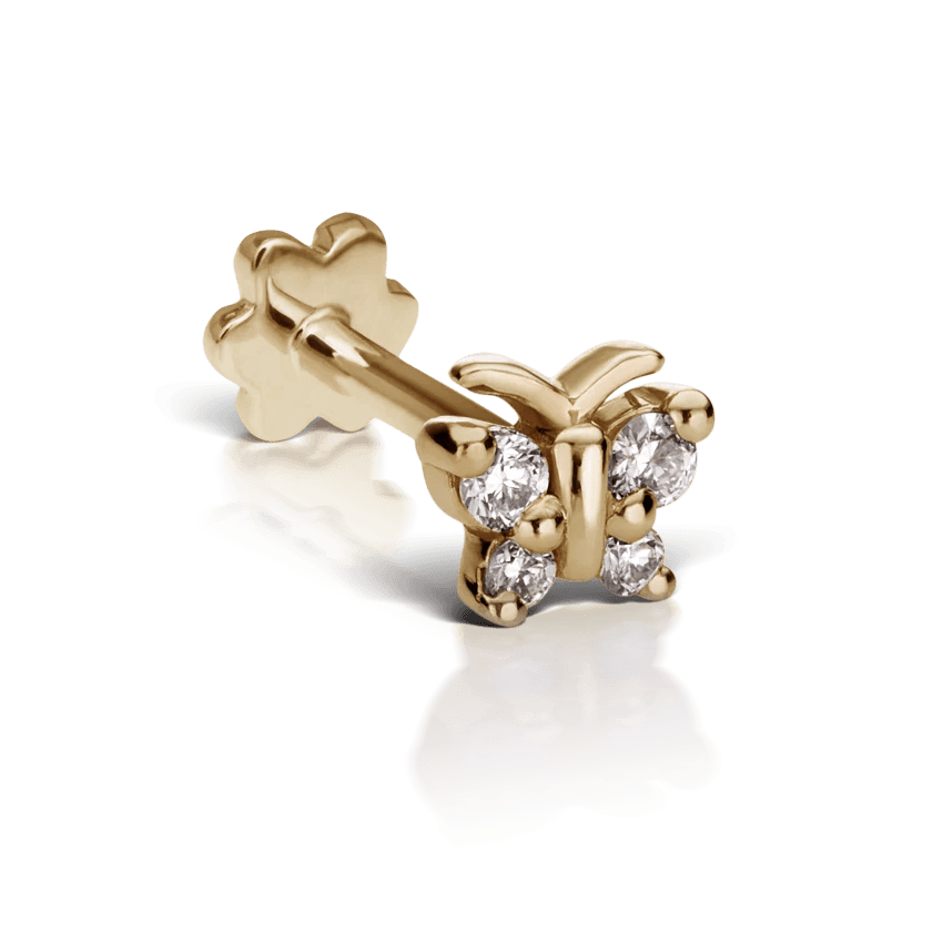 Maria Tash Diamond Butterfly, een gouden oorbel in vlindervorm versierd met diamanten. Model XBYD-YG-W4-001-1.