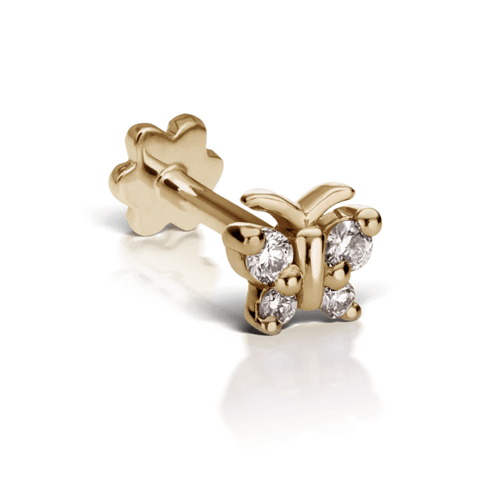 Maria Tash Diamond Butterfly, een gouden oorbel in vlindervorm versierd met diamanten. Model XBYD-YG-W4-001-1.