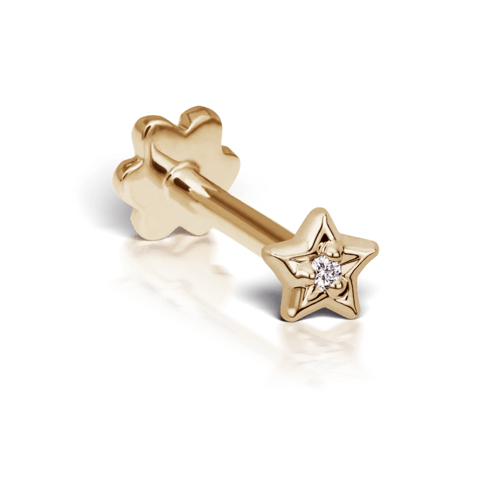 Maria Tash Diamond Solitaire Star XSSTARD YG, elegante stervormige oorbellen in goud met briljant, model XSSTARD-YG-W3-001-1.