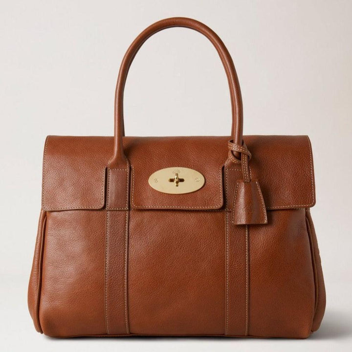 Mulberry Zak Bayswater erfenis NVT toont gestructureerde bruine leren tas met klassieke gouden gesp, model HH7941275G110