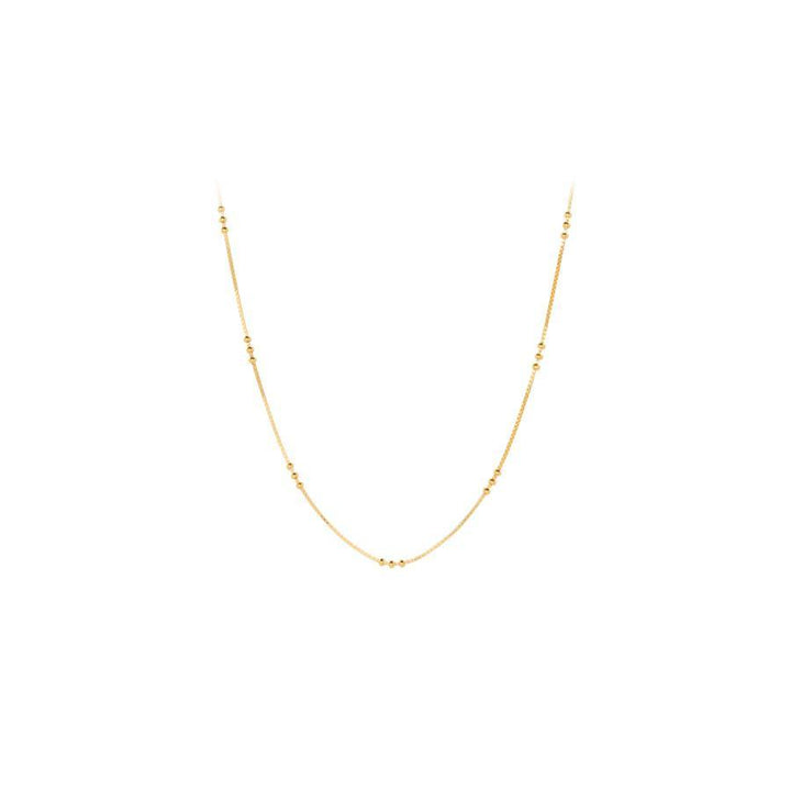 Pernille Corydon Eva Halsketting met kleine baldetails in een vergulde look tegen een witte achtergrond. Model N-721-GP
