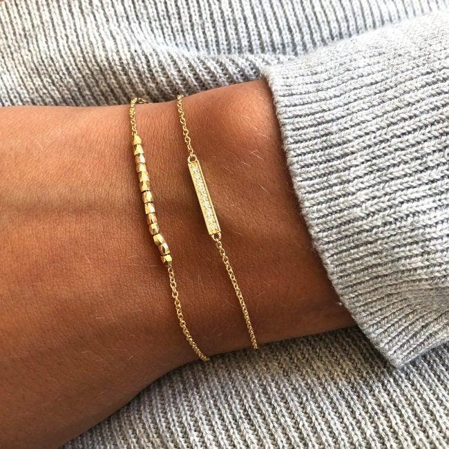 ro copenhagen 18kt rock kralen me armband in goud om de pols, minimalistische look, model 93319-002