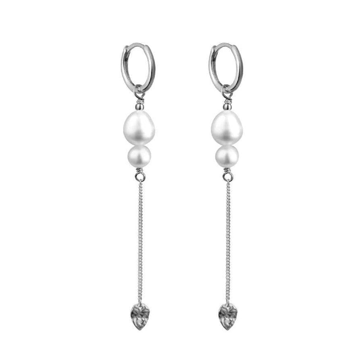 wioga antonia oorbellen zilver met witte parels en lange ketting, elegant design. Model E-8155-S